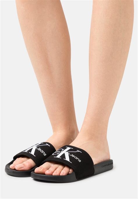 calvin klein slides womens cheap|calvin klein heeled mules black.